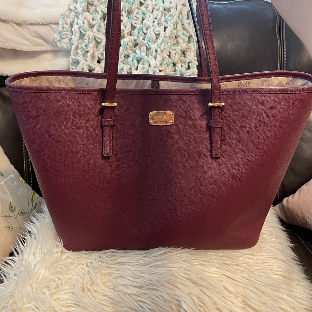Michael Kors Merlot colored leather Jet Set Travel Tote, Brand new with tags